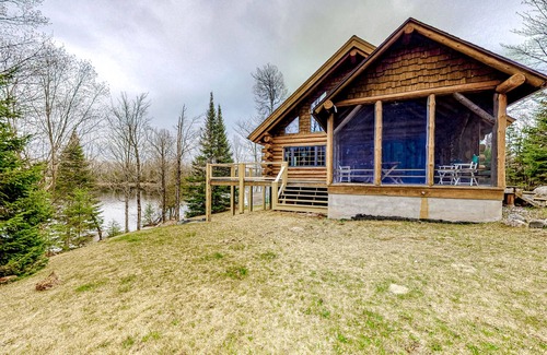 Presque Isle House | Three-Level Lakefront Getaway w/Free WiFi, Wood Fireplace, Game Room, & Dock