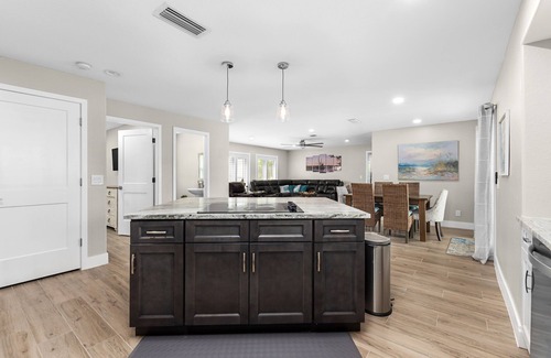 Saint James City House | THREE MASTER SUITES-POOL -WATERFRONT ON CORNER LOT - BOAT LIFT -OUTDOOR KITCHEN