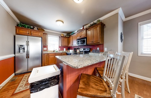 Helen House | Three-Story Riverfront Home w/a Private Hot Tub, Free WiFi, & Four Fireplaces