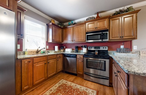 Helen House | Three-Story Riverfront Home w/a Private Hot Tub, Free WiFi, & Four Fireplaces