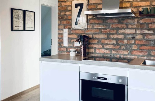 Wittduen Apartment | TIDE4 Amrum No. 7 - Modern apartment with wood-burning stove. 100m to the sea. Dogs welcome!