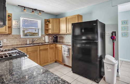 Bayou Vista House | Tiffany Blue Canal Home with Ocean Breeze