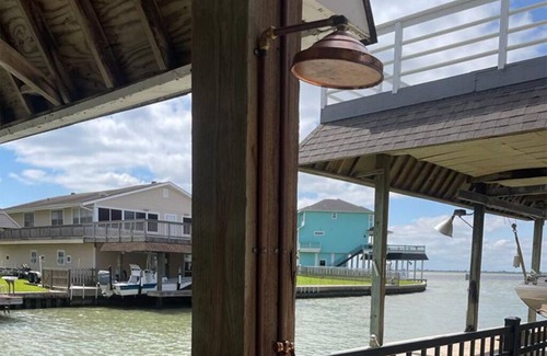 Galveston House | Tiki Paradise Water Front Home - 360° Oasis. Direct water access. Pet Friendly
