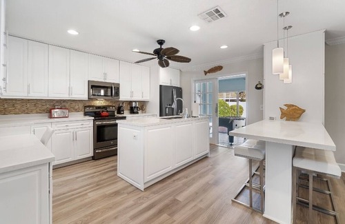 Dania Beach House | TIKI Retreat! Pool/game room! 5min to FLL and BEACH!