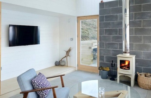 Waternish Cottage | Tinhouse - A Unique Cottage Overlooking the Dramatic Seascape of North West Skye