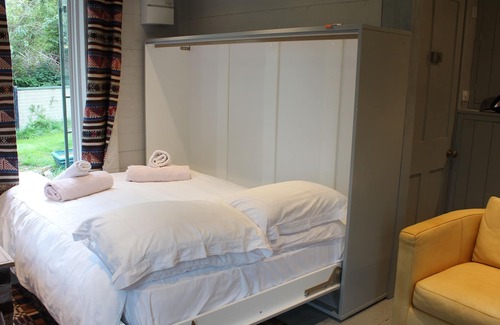 Fairlight Cottage | Tinkerbell's Lantern, 2 bed woodland lodge set in an area of outstanding beauty
