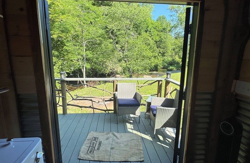 Hillsville Cabin | Tiny cabin sits by a bubbling, stocked creek. Pet friendly, for a fee, hot tub