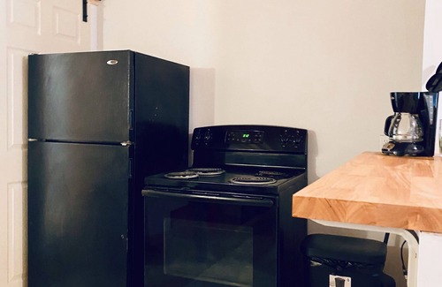 Gravois Park Apartment | Tiny Cottage - Big Loft