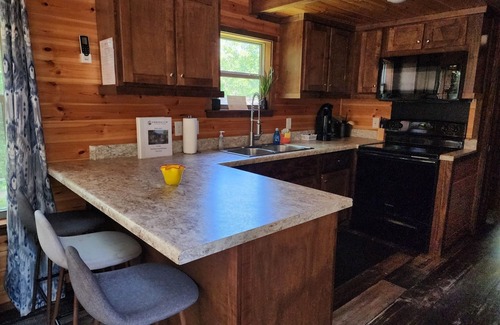 Mill Spring House | Tiny home on the creek, screened in porch, full kitchen, private firepit, sleeps 8