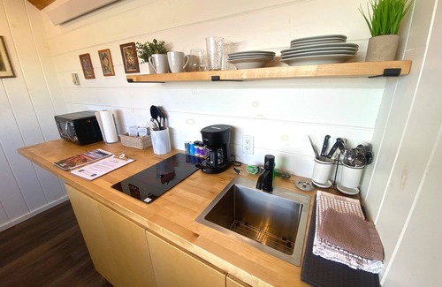 Grand Junction House | Tiny home with one queen bed on main floor.