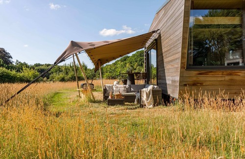 Beernem House | Tiny House looking over the sheep meadows