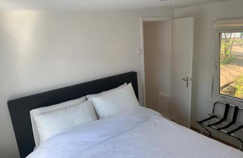 Amsterdam East House | Tiny Houseboat B&B on the Amstel River