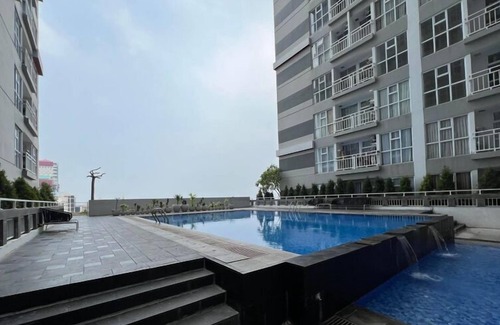 Surabaya Apartment | Tiny Studio with Pool View at Taman Melati Surabaya Apartment