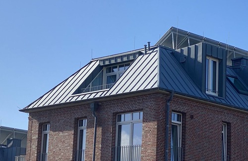 Wangerooge Apartment | Tolle Dachgeschosswohnung mit Meerblick und Ost-loggia - nur 100 m zum Strand!