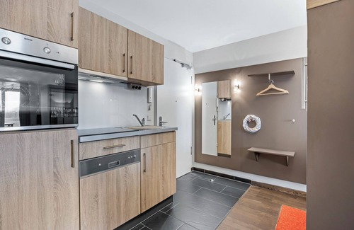 Wremen Apartment | Tolle Ferienwohnung in Strandnähe mit Sauna und Balkon mit Land- und Meerblick