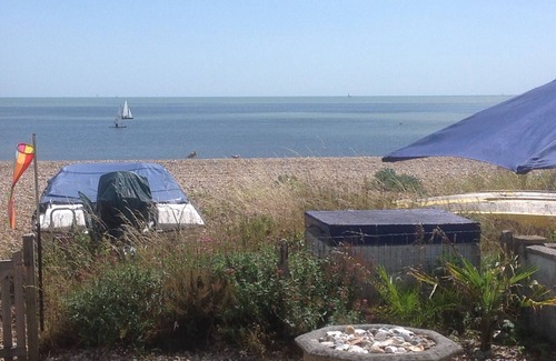 Pevensey House | Tombreck 3 bed bungalow on private beach with direct access to sea
