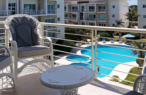 La Esplanada Apartment | Top-floor 3BD quiet Sosua condo wih large pool, WIFI, BBQ, A/C, Cable TV