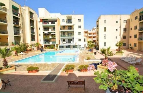 Bugibba Apartment | Top floor apt with common pool close to all amenities