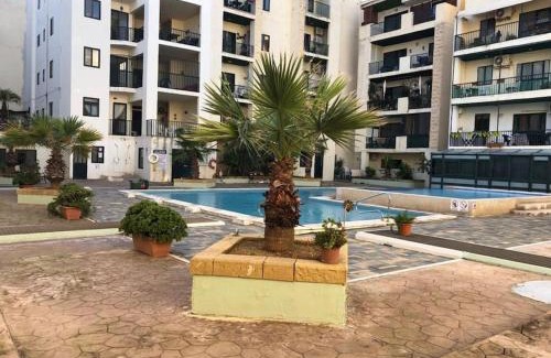Bugibba Apartment | Top floor apt with common pool close to all amenities