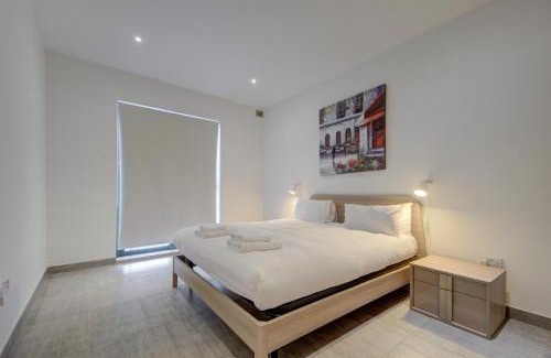Bugibba Apartment | Top floor apt with common pool close to all amenities