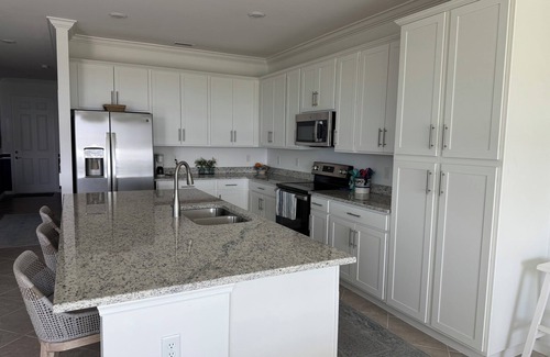 Biggar Condo | Top floor end unit condo with panoramic views in a serene setting