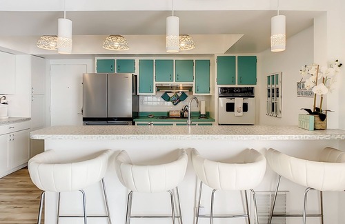 South Patrick Shores Condo | Top-floor, oceanfront condo with balcony