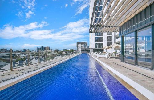 Spring Hill Apartment | Top of Spring Hill - Balcony Bliss and Poolside Escape