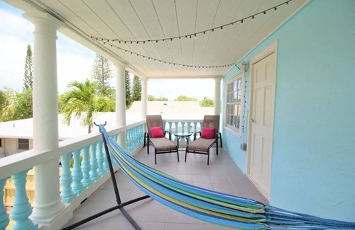 Mango Groves Apartment | Top SkyBlue Cottage Near Downtown and Beach