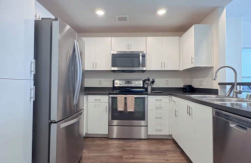 Carmel Valley Apartment | Torrey Gardens – Luxe 2BRs with ocean views, resort pool, and pet spa.