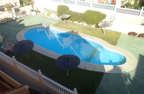 Urbanizacion Puerto de Estepona House | Town house with shared pool and stunning roof terrace, close to the beach