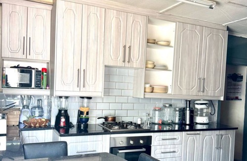 Bulawayo House | Trade Fair Ready 4 bedroom/2 bath Hillside Home - Breakfast Included. Sleeps 8