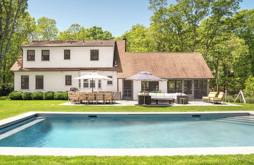 Sag Harbor House | Traditional-style home with pops of patterns and vibrant colors, private.