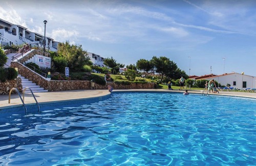 Arenal d'en Castell Apartment | Tranquil apartment with gorgeous sea views. 4 minutes walk to beach & amenities.
