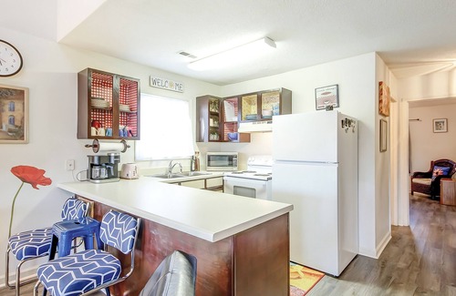 Surfside Beach Condo | Tranquil coastal condo with 2 pools & enclosed porch - near golf & beaches