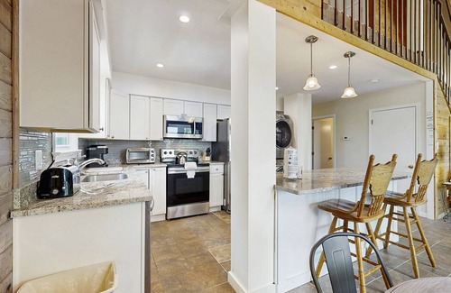 Livingston House | Tranquil lake cabin with private waterfront, modern kitchen, deck & sunset views