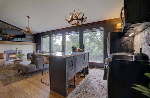 Greater Napanee Apartment | Tranquil/Private King Suite, Cozy, Riverfront w/hot tub,fireplace,firepit,trail.