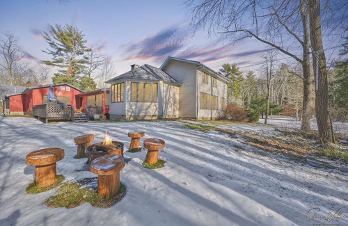 Canadensis Cabin | Tranquil Retreat: Rustic Cabin with Creek, Indoor Pool, and Theater Room