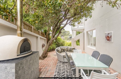 Plettenberg Bay Apartment | Tranquil Stay-Pizza oven & sea views. No clean fee