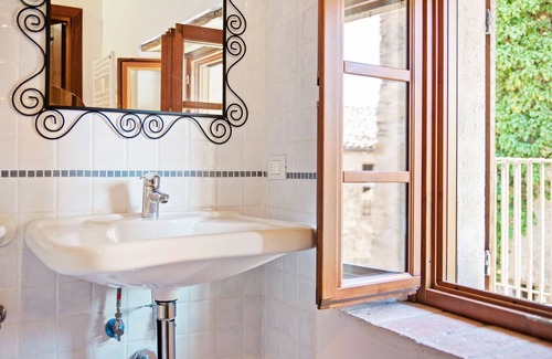 Ca' de' Grimaldi House | Tranquil Village Stay with Fireplace