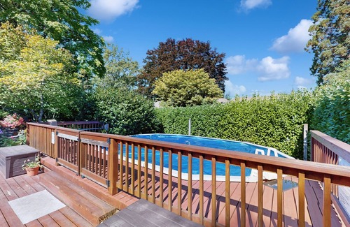Multnomah House | Tranquil, walkable home with seasonal pool, beautiful gardens & 2 patios