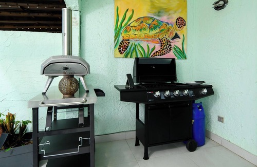 Jolly Harbour Villa | Tranquil Waterfront Villa ~ steps from the Beach, with bikes and terrace views