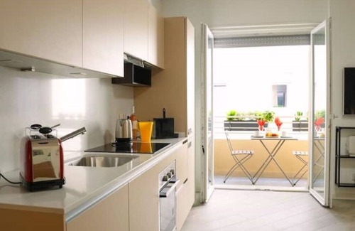 Testaccio Apartment | Trastevere Romantic & Chic | Kitchen | Balcony
