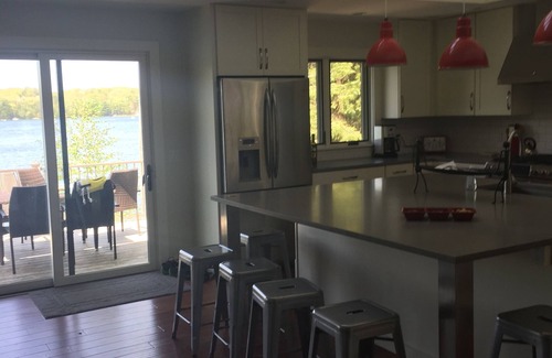 Mayfield House | Traverse City, Michigan; Luxury on all sports Spider Lake; 200 ft sandy beach