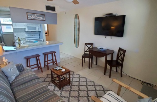 Sunset Beach Condo | Treasure Island Getaway 1/1 with water views and on-site pool!