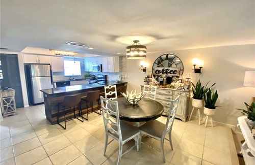 Capri Isle House | Treasure Island St Pete Beach FL 2BR 4BA Walk to Beach 3 level Garage Townhouse