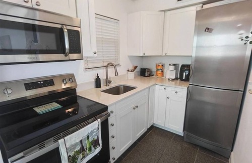 Capri Isle Condo | Treasure Island Waterfront Oasis Minutes to Beach Dock Sunsets at John’s Pass