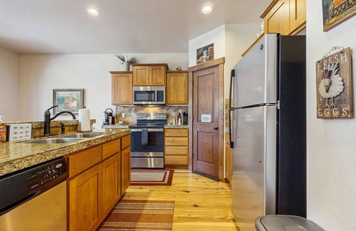 McCall House | Tree-lined home with forest views & wood stove - right on the golf course