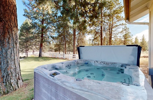 Sisters House | Tree-lined retreat with a hot tub, grill, game room, & W/D - mountain views