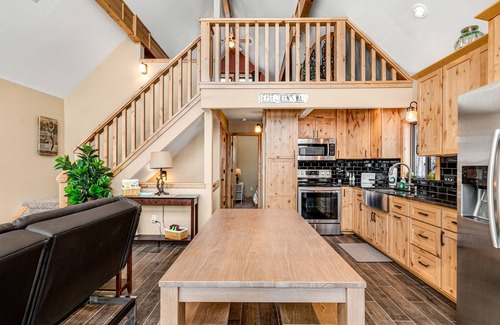 Nekoosa House | Tree-surrounded cabin with lake views, kayaks, wood-burning fireplace, & W/D