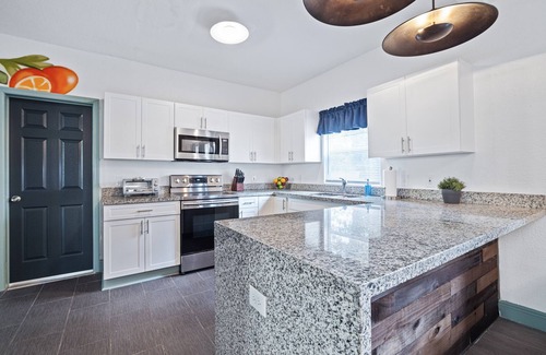 Tampa Heights House | Trendy 7 Bedroom Home | Private Heated Pool